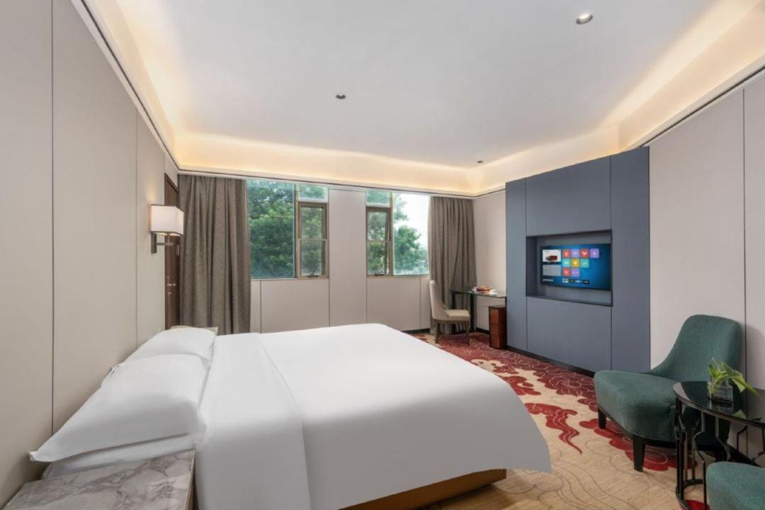 Mizparton Hotel South Qianjin Road Heshan  Esterno foto